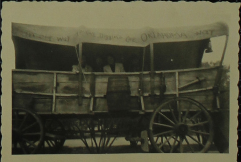 Friends posing in a wagon (ddr-densho-321-1377)