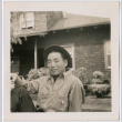 Young man on a bench (ddr-densho-377-1625)