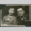 Japanese American soldier poses with Japanese woman (ddr-densho-397-170)