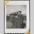 Men in formation with bugles with Battalion 2B Insignia (ddr-densho-434-61)