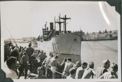 Soldiers transferred to a new ship for the ride home (ddr-densho-201-832)