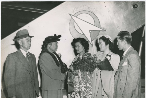 (Photograph) - Image of group of two men and three women standing next to aircraft ramp (PDF) (ddr-densho-332-37-mezzanine-d56718d0f3)