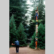 Calvin Iyoya playing football from the top of a totem pole (ddr-densho-336-924)