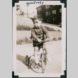 Toddler riding tricycle (ddr-densho-483-674)