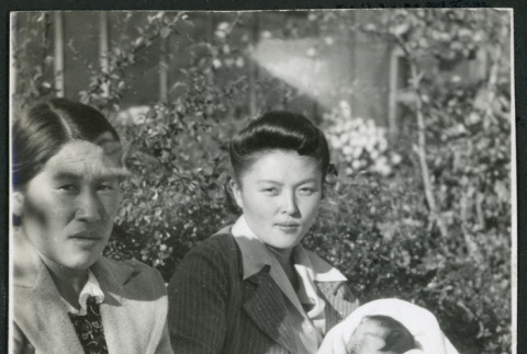 Photograph of women holding infants at Manzanar (ddr-csujad-47-232)