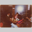 Four people at a table (ddr-densho-426-1253)