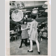 Photo of women in Takahashi retail shop (ddr-densho-424-1101)