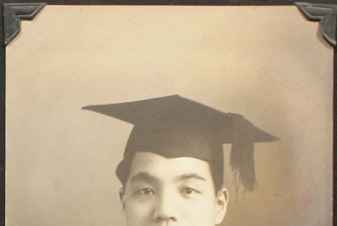Nikkei man in graduation cap and gown (ddr-densho-259-397)