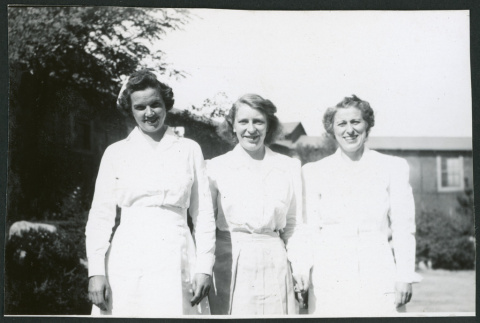 Photograph of nurses and Dr. Agnes V. Bartlett in front of the Manzanar hospital (ddr-csujad-47-322)