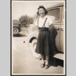 Florence Maeda standing next to car (ddr-densho-493-159)