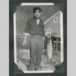 Man holding fish (ddr-densho-540-90)