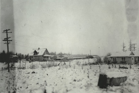 Snowy field with houses (ddr-densho-134-31)
