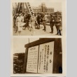 Civilians and soldiers on a bridge and a notice posted regarding traffic (ddr-njpa-6-53)