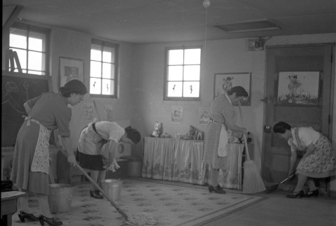 Members of the Parent Teacher Association cleaning classrooms (ddr-fom-1-835)