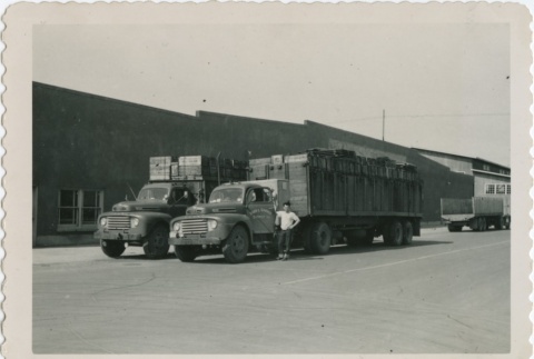 Two Farm & Garden Supply, Co trucks (ddr-densho-296-89)