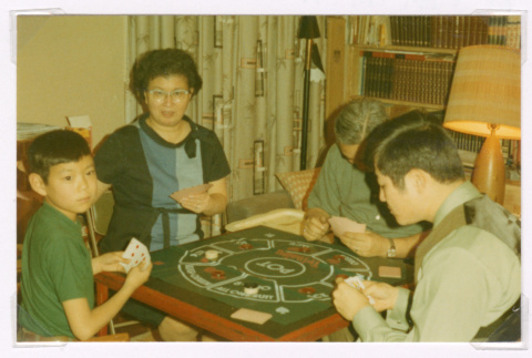 Isoshima family playing tripoley (ddr-densho-477-387)