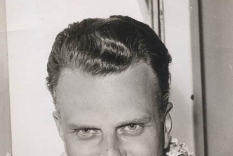 A man wearing leis (ddr-njpa-1-481)