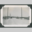 Cars on dirt road (ddr-densho-471-32)