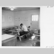 Man sitting in the nurse aids and attendants classroom (ddr-fom-1-849)