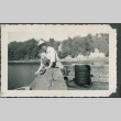 Man fishing off a dock (ddr-densho-321-972)