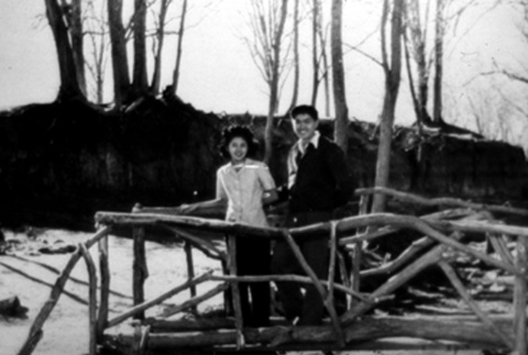 Couple in an concentration camp garden (ddr-densho-34-168)