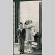 Girl and boy with baby (ddr-densho-523-56)
