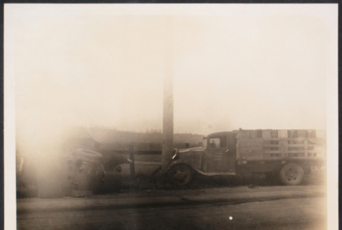 Two trucks, one overturned (ddr-densho-493-158)