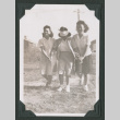 Two women lead a blindfolded woman (ddr-densho-471-46)