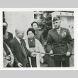 Captain Abie Gordon returns Bizen Osafune heirloom sword to Isamu Nagano (ddr-densho-1007-242)