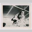 Man by wall (ddr-densho-378-1102)