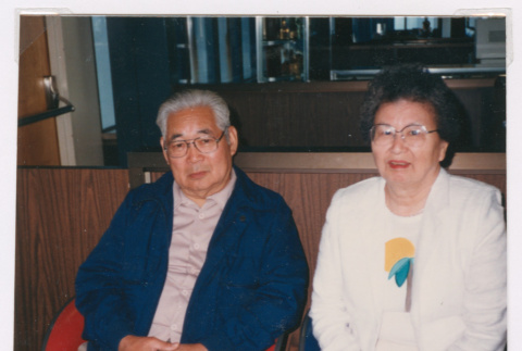 Mitzi and Takeo Isoshima waiting for the airplane (ddr-densho-477-607)