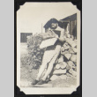 Alice Kikawa reading a newspaper (ddr-densho-542-609)