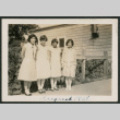 four girls in front of railing (ddr-densho-378-680)