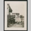 2 women in a yard (ddr-densho-378-826)