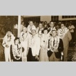 Hilario Moncado and others wearing leis (ddr-njpa-2-716)