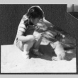 Donna Kishi and puppy (ddr-densho-443-103)
