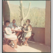 Sakura family at picnic table (ddr-densho-523-480)