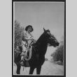 [Mazie on a Horse] (ddr-csujad-56-206)