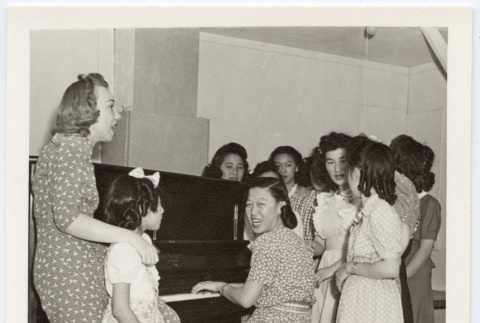 Girls around piano (ddr-hmwf-1-18)