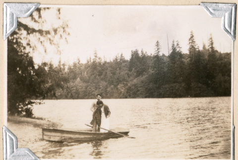 Couple in rowboat at Star Lake (ddr-densho-383-25)