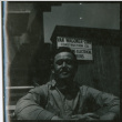 Man on break at construction company (ddr-densho-377-1606)