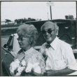 Chester and Agnes Sakura with flowers (ddr-densho-523-639)