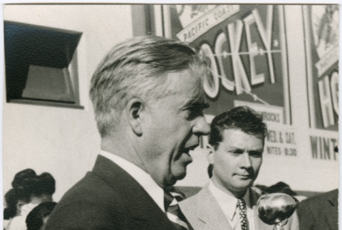 Man speaking at microphone (ddr-densho-426-985)