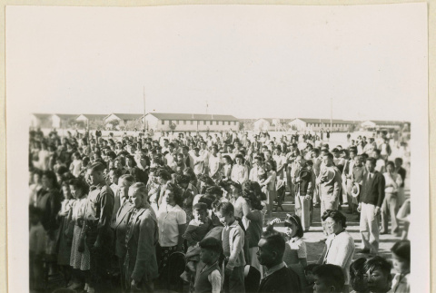 Crowd listening to the soldier's last call (ddr-densho-37-1156)
