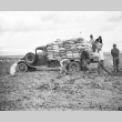 Farmers loading truck (ddr-densho-37-83)