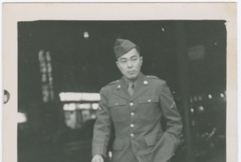 Man in army uniform walking (ddr-densho-332-26)