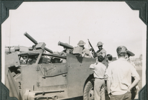 Group of men in armored vehicle (ddr-ajah-2-103)
