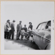 Shiomi family with others standing by car (ddr-densho-522-562)
