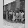 Japanese Americans standing in shade (ddr-densho-151-280)