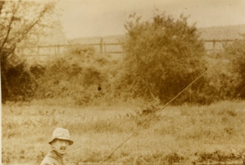 Neville Chamberlain fishing (ddr-njpa-1-16)